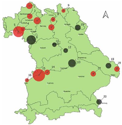 Bayernkarte mit roten und grünen Kreisen unterschiedlicher Größen.